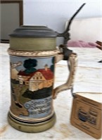 German stein measuring approximately 4 inches