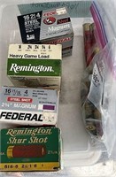 Four boxes of 16 gauge shotgun shells mostly for