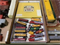 Sixteen N Scale Toy Trains (Some Missing Wheels)