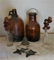 Antique brown bottle, jug, butterfly wind chime