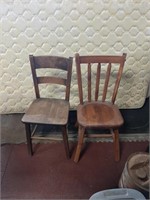 To primitive wooden chairs