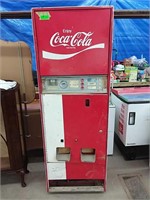 Coca-Cola brand upright can pop dispenser cooler