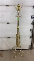 Gold coloured coat rack. 6ft tall. Easily comes