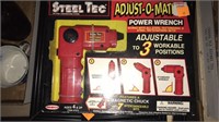 Steel Tec. Adjust o matic. Toy wrench.