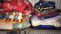 Large lot of blankets, afghans, quilt, pillows.