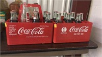 2 plastic 8 pack Coca Cola carriers.  Coke