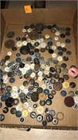 Box of vintage buttons.