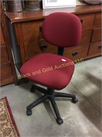 Small maroon office chair