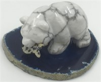 Stone carving of a bear on a polished agate slab 3