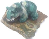 Malachite carving of a bear on a polished jasper s