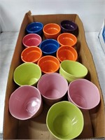 lot of different coloured planter pots