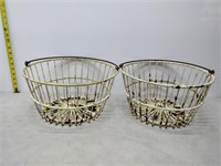 two metal egg baskets