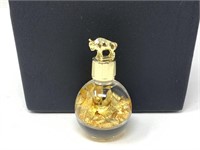 Genuine Montana gold leaf flakes in bottle