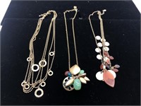 Lot of three metal chain necklaces