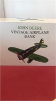 John Deere vintage airplane bank here in the box