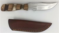 Short fixed bladed knife with wood scales and antl