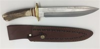Spear point hunting knife with brass cross guard a