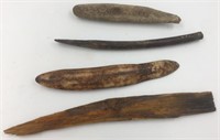 Assortment of ancient fossilized ivory and wood ar