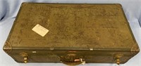 Vintage steel sided suitcase in fair condition