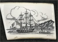 Scrimshawed ivory section of a sailing vessel at h