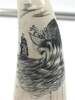 Small scrimshawed whale's tooth, depicting a catas