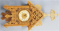 Ornate pattern wall mounted clock with beautiful f