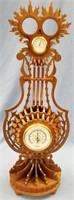 Ornate pattern mantel, musical barometer, hydromet