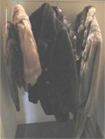 Closet full of ladies furs and fur coats: English
