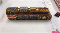 Golden piston express tin train engine