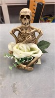 Skeleton, white rose