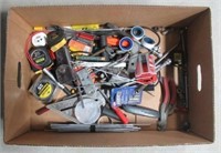 Garage items including hand tools, tape measures,