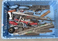 Garage items including screw drivers, socket rail