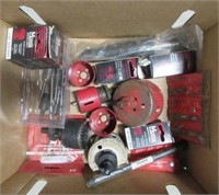 Assortment of hole saw bits and Snap-On