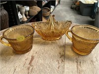 Two Amber Glass Coffee Tea Cups and Glass Basket