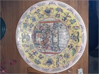 large oriental shallow bowl repaired