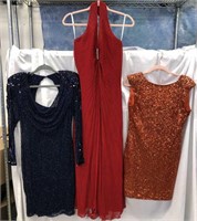 Red Gown and pair of cocktail dresses