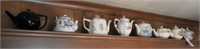 (8) vintage tea pots in various motifs by