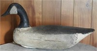 Early Canada goose decoy with loss of paint and