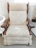 Upholstered rocker with open wooden arms