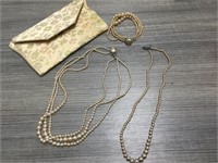 Two vintage pearl necklaces and a bracelet with
