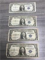 Four 1935 one dollar silver certificates