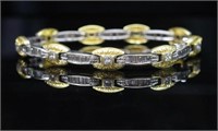 A good diamond and two tone gold bracelet