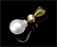 Baroque pearl, diamond and 18ct yellow gold