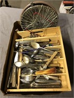 Silverware in wood tray, cake pans, steamer basket