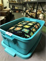 Blue tub w/ lid, crocheted blankets