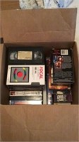 2 Boxes of vhs tapes,cassette tapes