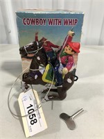 COWBOY WITH WHIP WIND-UP TOY IN BOX