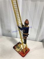 CLIMBING FIREMAN WIND-UP TOY