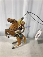 COWBOY ON HORSE WIND-UP TOY, 8" T
