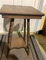 Small antique side table with one shelf below.
